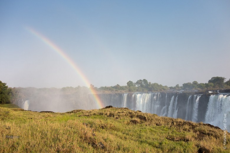 Visiter Victoria Falls : arc en ciel sur les chutes